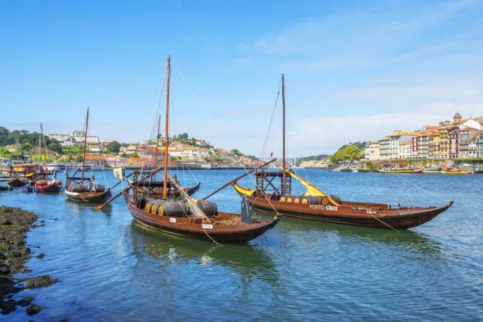 Framed Print : Rabelo boats with river Douro and Ribeira, Porto, Portugal
