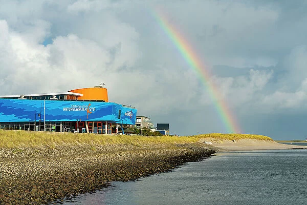 Rainbow over coastline and experience center Naturgewalten Sylt, List, Sylt, Nordfriesland, Schleswig-Holstein, Germany