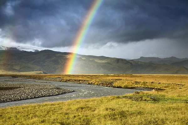 Rainbow over river - Iceland, Southern Region, Vik