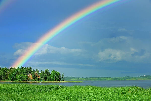 Rainbow after storm Saint-Gedeon, Quebec, Canada