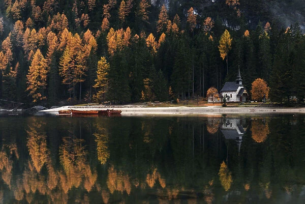 Rainy afternoon at the Braies lake in autumn, Dolomites, Italy