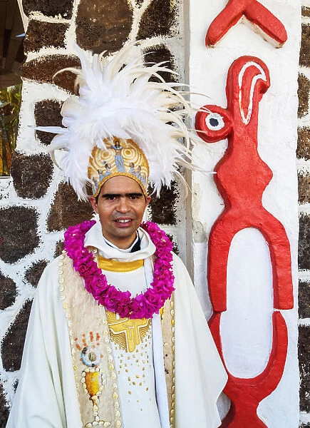 Rapa Nui Priest in front of the church on Easter Sunday, Hanga Roa, Easter Island, Chile