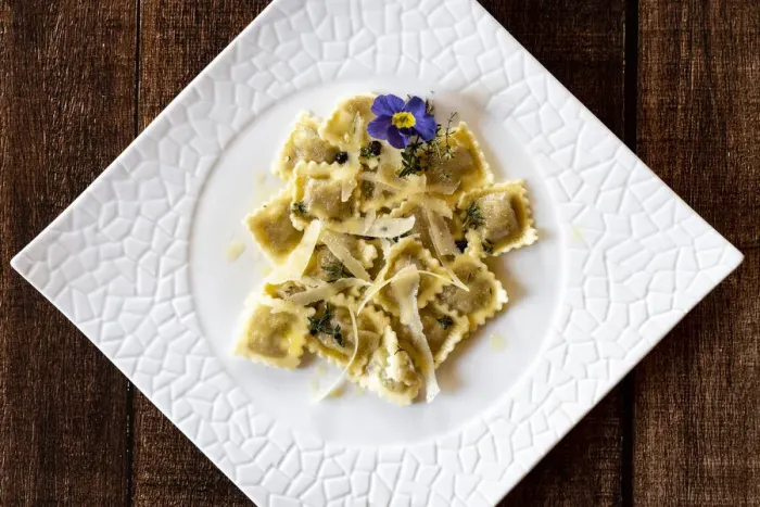 Framed Print : Ravioli traditional pasta stuffed with game meat in white dish from above Framed Print : Ravioli traditional pasta stuffed with game meat in white dish from above