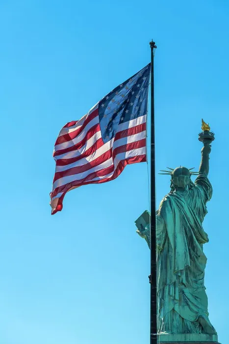 Framed Print : Rear side of Statue of Liberty with US flag, Liberty Island, New York, USA Framed Print : Rear side of Statue of Liberty with US flag, Liberty Island, New York, USA