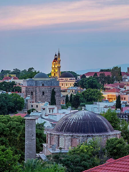 Recep Pasha Mosque, Sultan Mustafa Mosque, Suleiman Mosque and Clock Tower at dusk Medieval Old Town, Rhodes City, Rhodes Island, Dodecanese, Greece