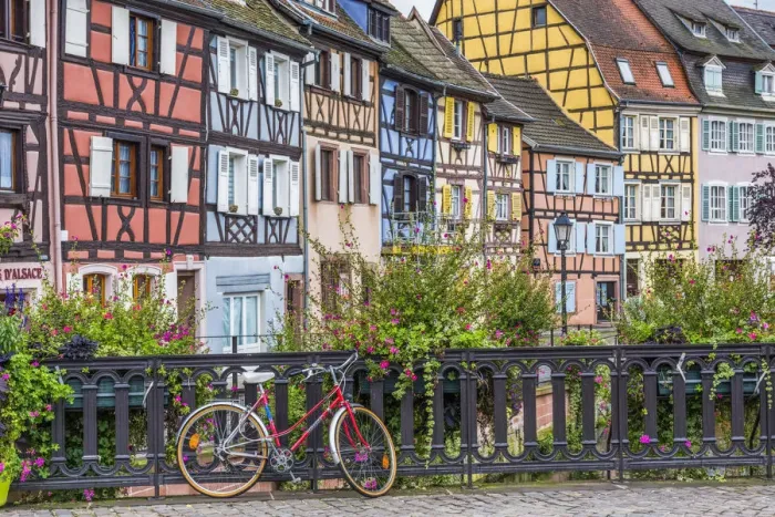 Framed Print : Red Bike & Timbered Buildings, Colmer, Alsace, France Framed Print : Red Bike & Timbered Buildings, Colmer, Alsace, France