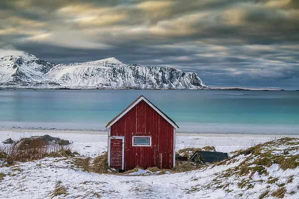 Red Cabin on Ramberg Beach, Lofoten Islands, Norway