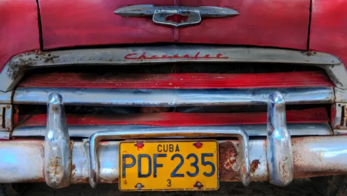 Framed Print : Red car in Havana, Cuba, Caribbean Framed Print : Red car in Havana, Cuba, Caribbean