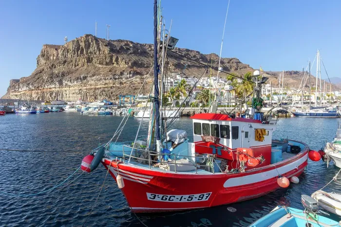 Framed Print : A red fishing boat at Puerto de Mogan, Gran Canaria, Canary Islands, Spain Framed Print : A red fishing boat at Puerto de Mogan, Gran Canaria, Canary Islands, Spain