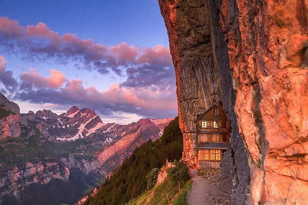 Red light of sunrise at Berggasthaus Aescher, Canton of Appenzell, Alpstein, Switzerland