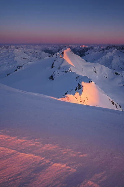 Red light of sunrise from the summit of San Matteo Peak