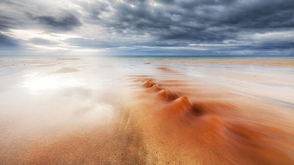 The red river in Traigh Mhor beach, North Tolsta, Hebrides, Scotland, United Kingdom