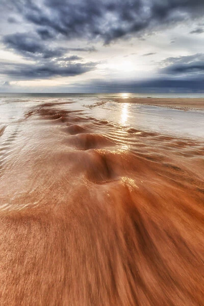 The red river in Traigh Mhor beach, North Tolsta, Hebrides, Scotland, United Kingdom