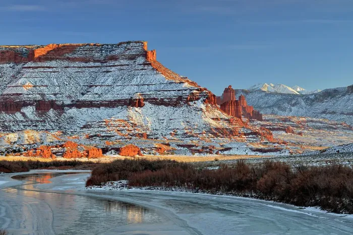 Framed Print : Red rock formations and Colorado River with snow in winter near sunset, Colordao Riverway Recreation Area, Utah, USA