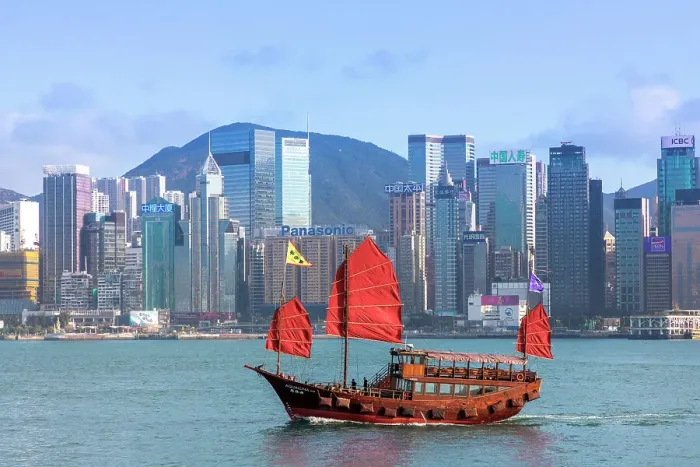 Framed Print : A Red Sail Junk in Hong Kong Harbour, Hong Kong, China Framed Print : A Red Sail Junk in Hong Kong Harbour, Hong Kong, China