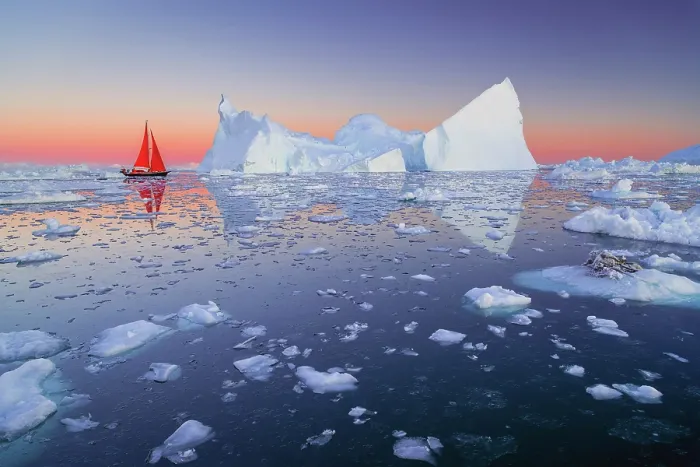 Framed Print : Red sailboat at dusk near icebergs in Disko Bay, Greenland Framed Print : Red sailboat at dusk near icebergs in Disko Bay, Greenland