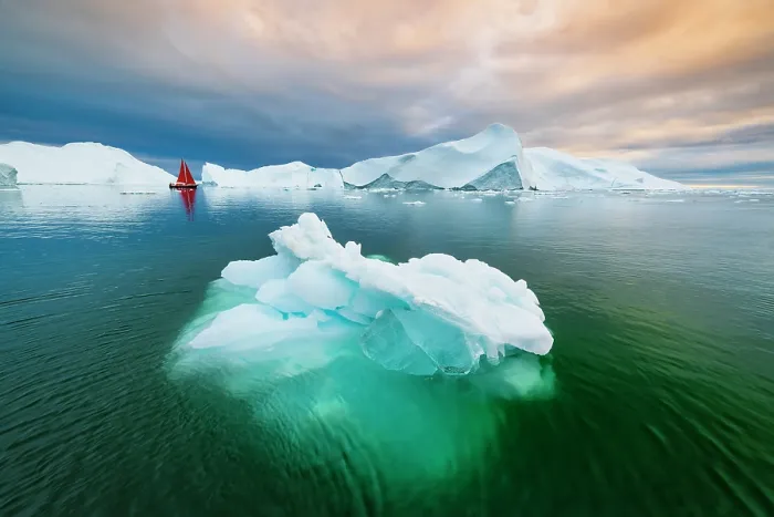 Framed Print : Red sailboat and icebergs in Disko Bay, Greenland Framed Print : Red sailboat and icebergs in Disko Bay, Greenland