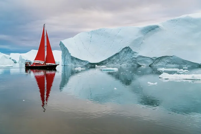 Framed Print : Red sailboat and icebergs in Disko Bay, Greenland Framed Print : Red sailboat and icebergs in Disko Bay, Greenland