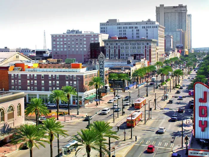 Framed Print : Red street cars on Canal Street pass by the renovated Saenger and Joy Theaters. Canal Street, New Orleans, Louisiana, USA Framed Print : Red street cars on Canal Street pass by the renovated Saenger and Joy Theaters. Canal Street, New Orleans, Louisiana, USA