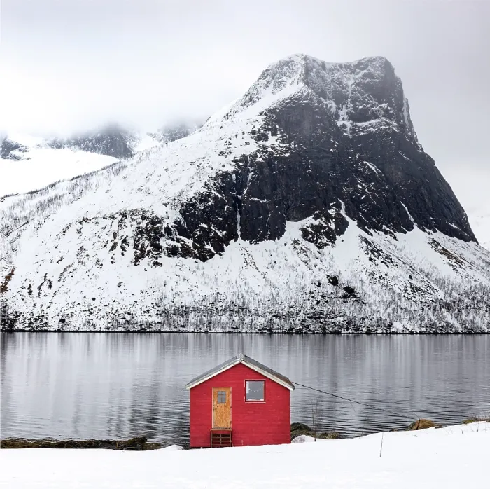 Framed Print : Red timber rorbu (cabin) with Bergsfjord and snow-covered mountains in the distance, Bergsbotn, Senja, Norway Framed Print : Red timber rorbu (cabin) with Bergsfjord and snow-covered mountains in the distance, Bergsbotn, Senja, Norway