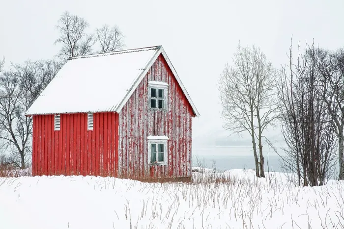 Framed Print : Red timber rorbu (cabin) in the snow, Bergsbotn, Senja, Norway