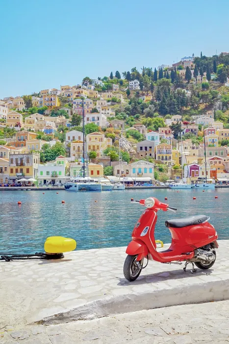 Framed Print : Red vespa scooter parked at Gialos harbour, Gialos, Symi Island, Dodecanese Islands, Greece Framed Print : Red vespa scooter parked at Gialos harbour, Gialos, Symi Island, Dodecanese Islands, Greece