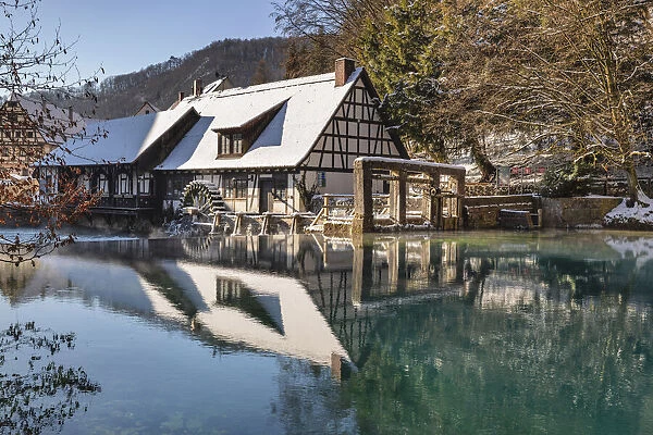 Mill reflecting in Blautopf Spring, Blaubeuren, Swabian Jura, Baden-Wurttemberg, Germany