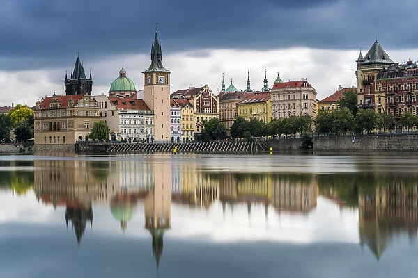 Reflection of Bedrich Smetana Museum and Old Town Waterworks at Smetanovo nabrezi, Prague