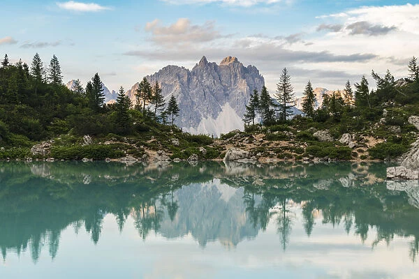 Reflection of Cadini di Misurina on Sorapis Lake in summer. Cortina d Ampezzo