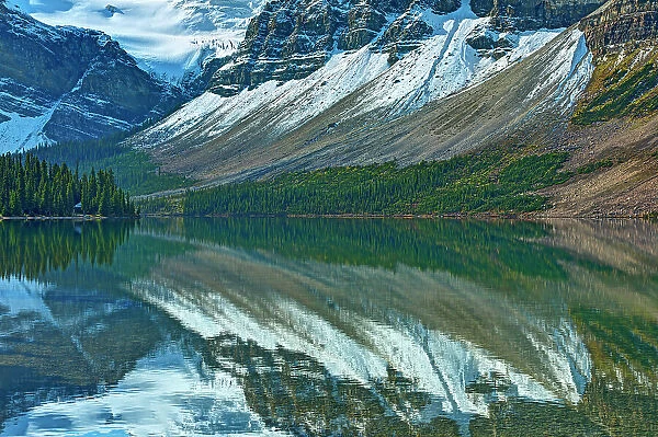 reflection of the Canadian Rocky Mountains in Bow Lake, Banff National Park, Alberta, Canada