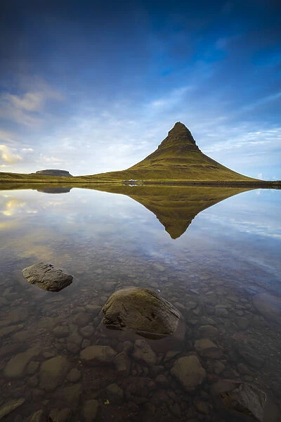 Reflection of Kirkjufell mountain in still water, Snaefellsness Peninsula, Western