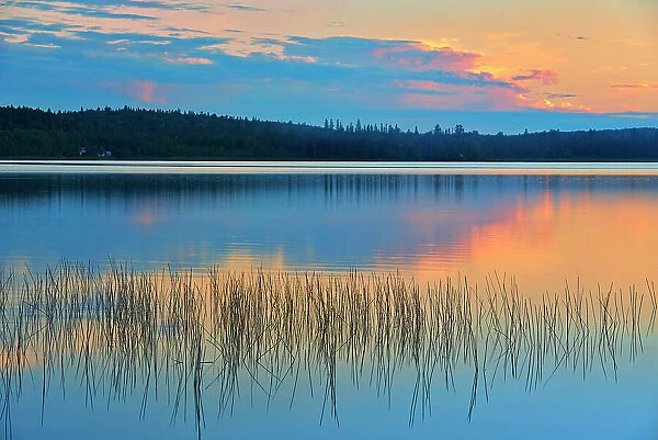 Reflection on Lac des Sables at sunset Belleterre, Quebec, Canada
