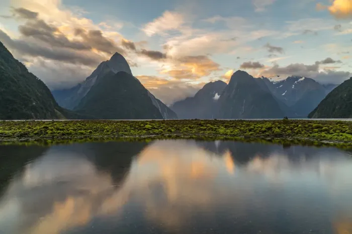 Framed Print : Reflection of Milford Sound with low tide at sunset in summer Framed Print : Reflection of Milford Sound with low tide at sunset in summer