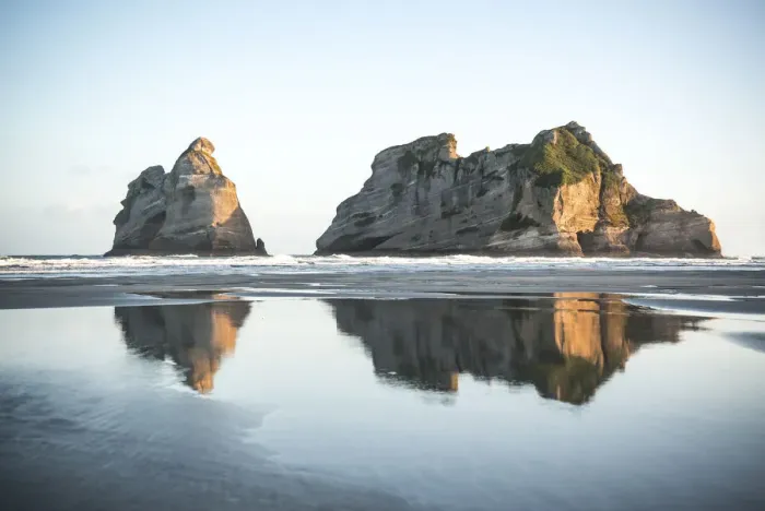 Framed Print : Reflection in Wharariki Beach, South Island, New Zealand, Oceania Framed Print : Reflection in Wharariki Beach, South Island, New Zealand, Oceania