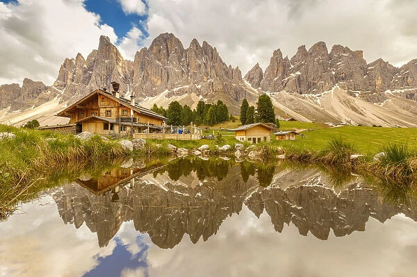 Reflections of Odle group and Geisleralm (Rifugio delle Odle), Funes valley, South Tyrol