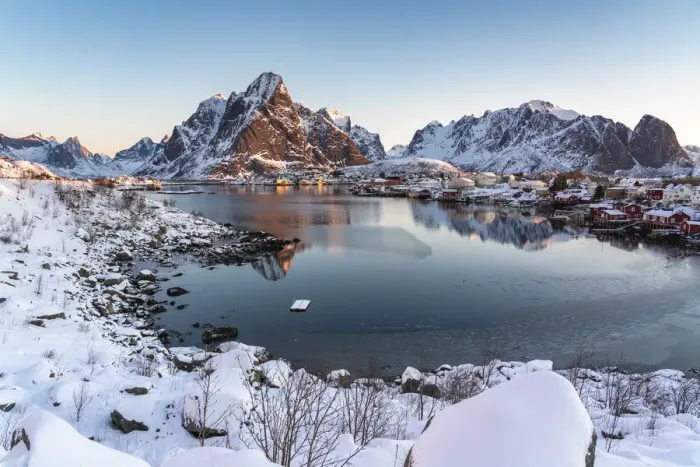 Framed Print : Reine fjord at dawn, with Olstinden, Lilandstinden and Festheltinden peaks in winter