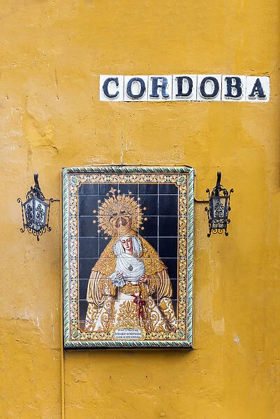 Religious icon tile work of the Virgin Mary or Madonna in a street of Seville, Andalusia