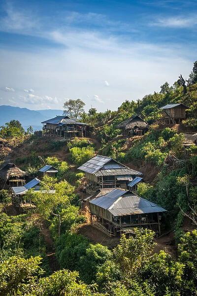Remote village of Eng tribe built on a slope in mountains near Kengtung