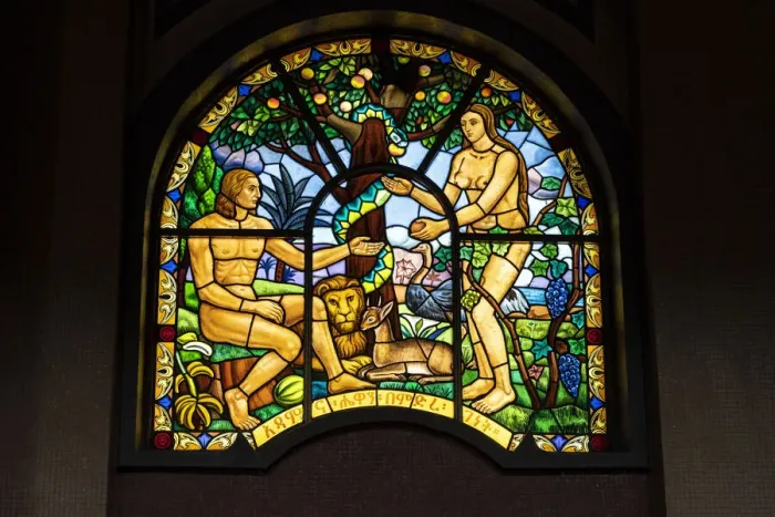 Framed Print : Representations of Adam and Eve on stained glass windows inside Holy Trinity Cathedral Framed Print : Representations of Adam and Eve on stained glass windows inside Holy Trinity Cathedral