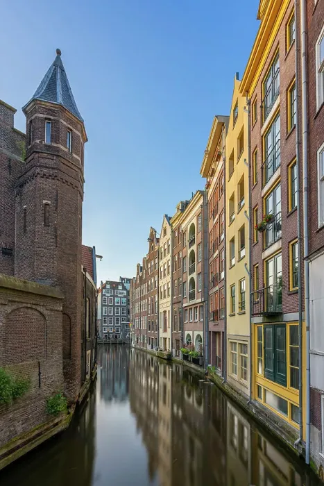 Framed Print : Residential buildings and houses amidst Oudezijds Achterburgwal canal against sky, De Wallen, Amsterdam, Netherlands Framed Print : Residential buildings and houses amidst Oudezijds Achterburgwal canal against sky, De Wallen, Amsterdam, Netherlands