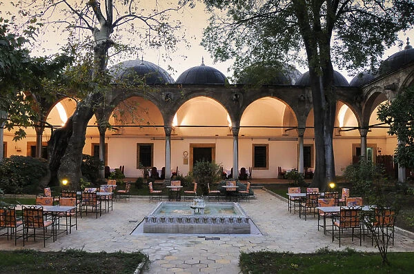 A restaurant in an old caravanserai. SAoleymaniye Camii, Istanbul, Turkey