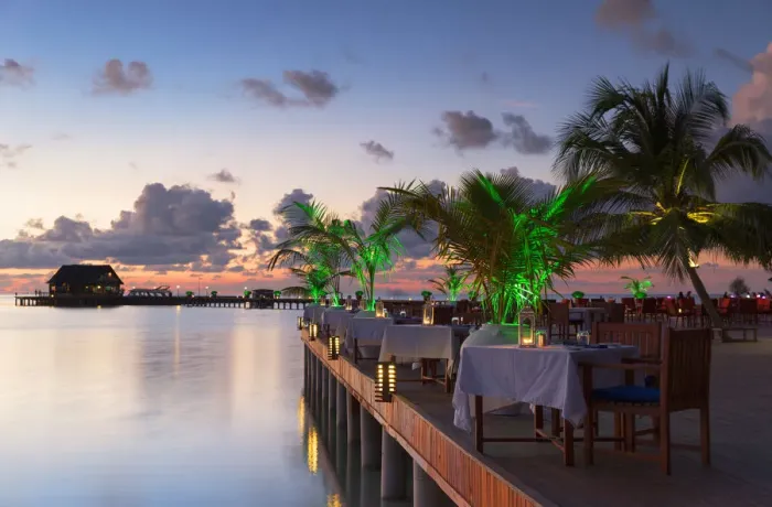 Framed Print : Restaurant at Olhuveli Beach and Spa Resort at sunset, South Male Atoll, Kaafu Atoll