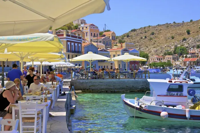 Framed Print : Restaurant In Symi Harbour, Symi, Dodecanese, Greek Islands, Greece, Europe Framed Print : Restaurant In Symi Harbour, Symi, Dodecanese, Greek Islands, Greece, Europe