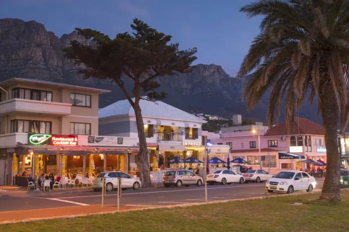 Framed Print : Restaurants in Camps Bay at dusk, Cape Town, Western Cape, South Africa Framed Print : Restaurants in Camps Bay at dusk, Cape Town, Western Cape, South Africa
