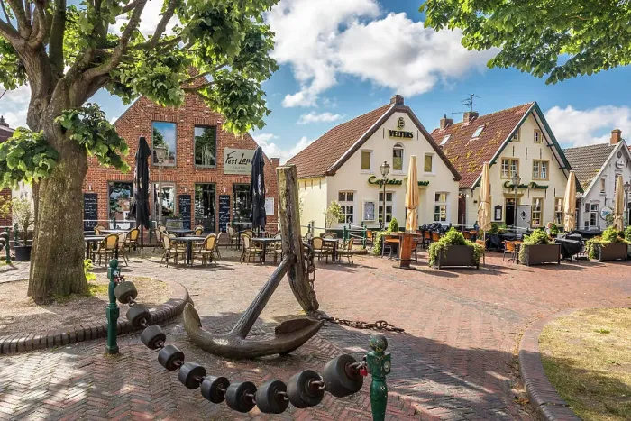 Framed Print : Restaurants at the harbor in Greetsiel, East Frisia, Lower Saxony, Germany Framed Print : Restaurants at the harbor in Greetsiel, East Frisia, Lower Saxony, Germany