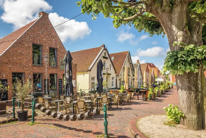 Framed Print : Restaurants at the harbor in Greetsiel, East Frisia, Lower Saxony, Germany Framed Print : Restaurants at the harbor in Greetsiel, East Frisia, Lower Saxony, Germany