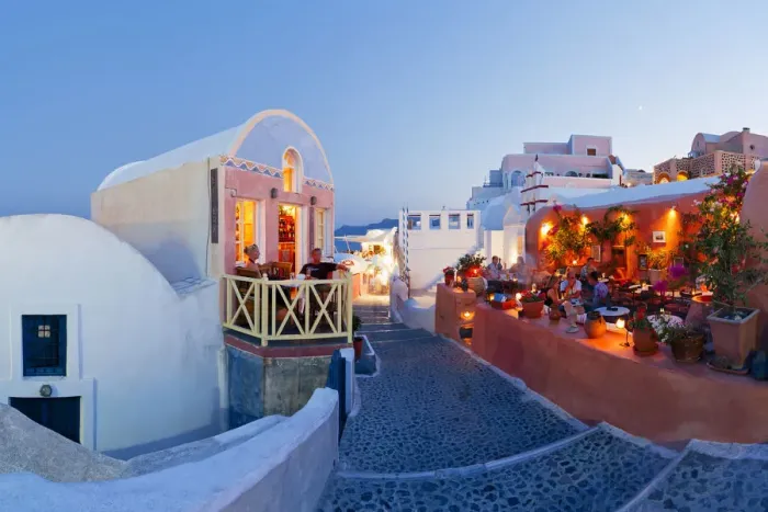 Framed Print : Restaurants in the village of Oia (La), Santorini (Thira), Cyclades Islands, Aegean Sea