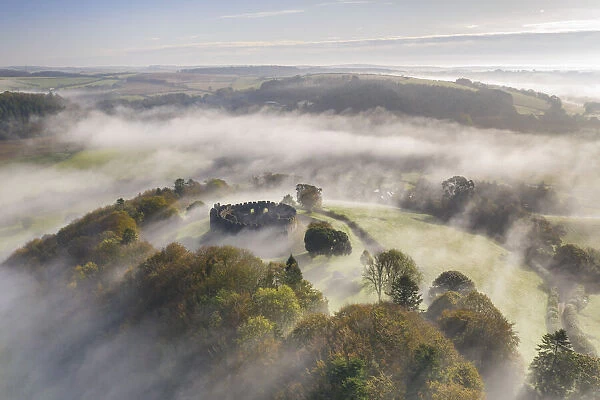 Restormel Castle surrounded by morning mist, Lostwithiel, Cornwall, England