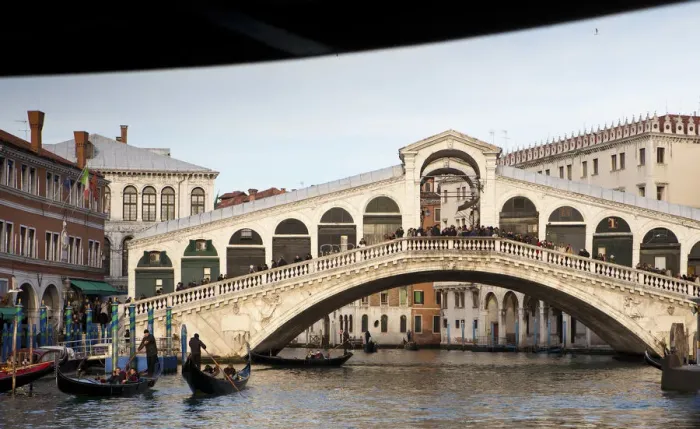 Framed Print : The Rialto Bridge is one of the four bridges spanning the Grand Canal in Venice