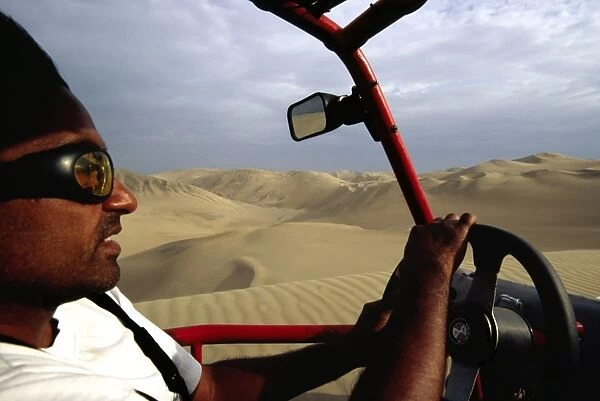 Riding in the front seat of a dune buggy
